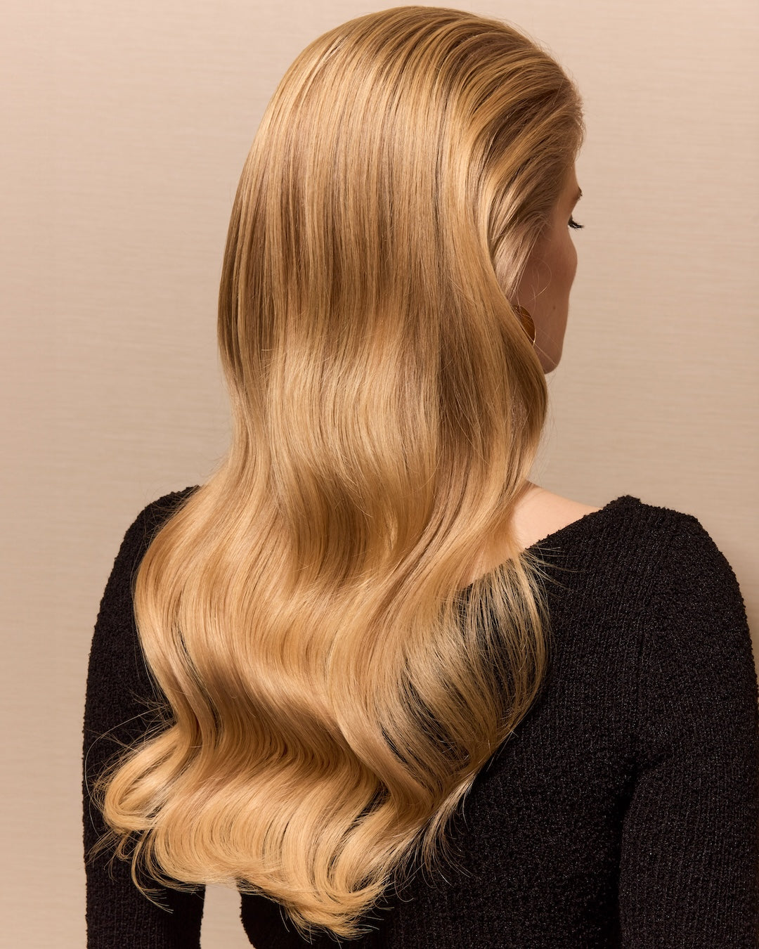 Long blonde hair with a fresh blowout 