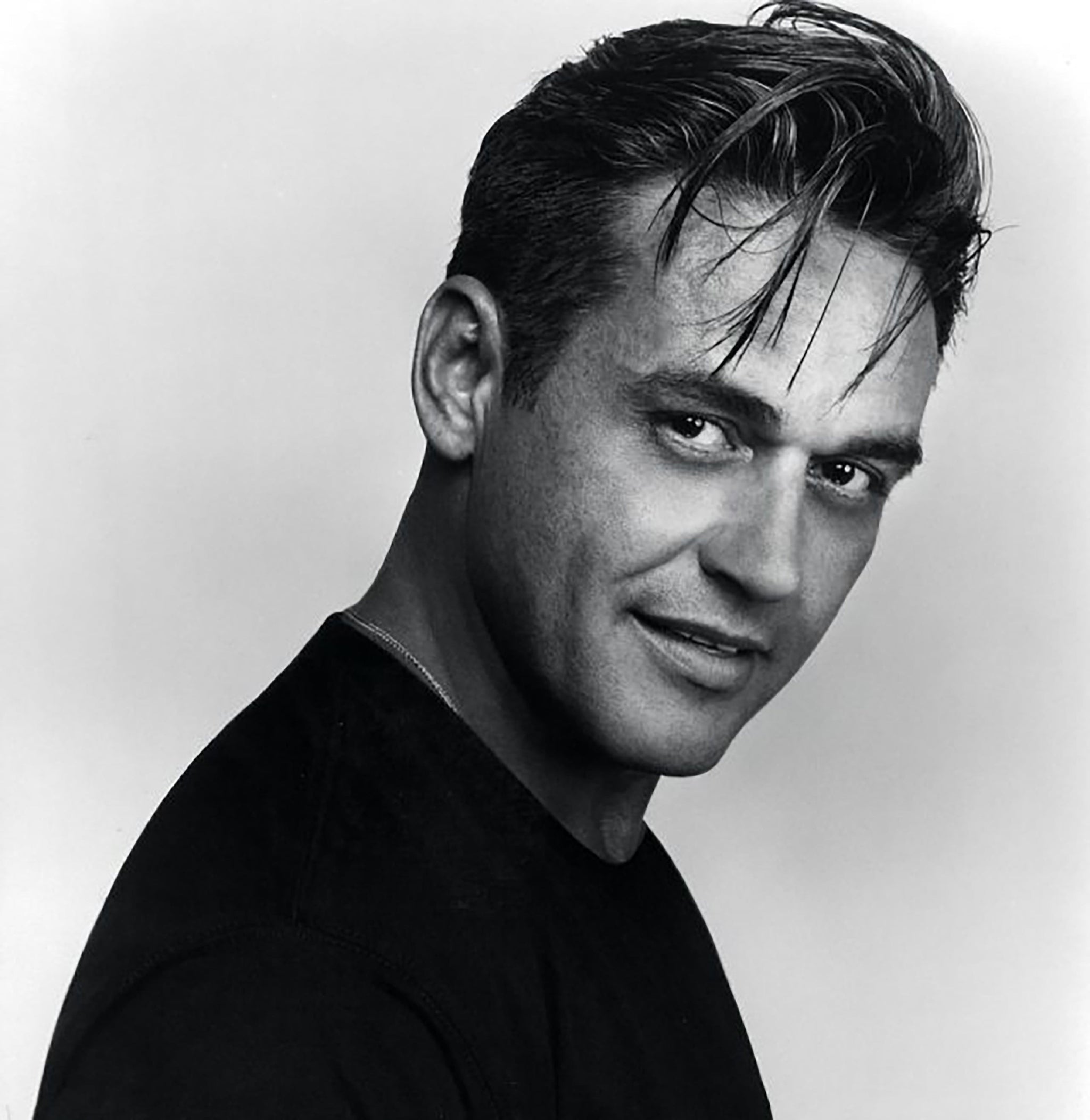 Oribe Canales headshot in black and white